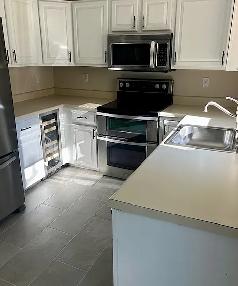 Kitchen with stainless steel appliances