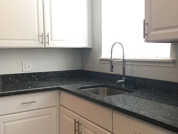 Kitchen Window 
Granite Countertops
New cabinets