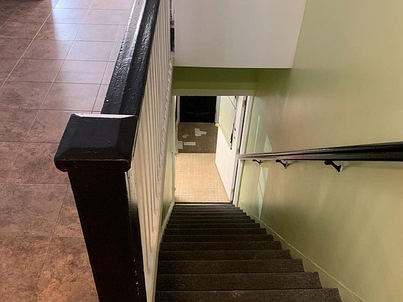 stairs to first floor of apartment.
