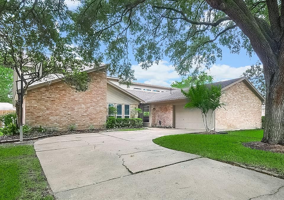 This unassuming home on this quiet tree-lined street has a wonderful surprise inside. From the outside, you would never guess this home is just under 3200 sq ft with 4 bedrooms and 2 full baths . . .