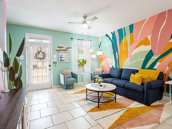 Natural light floods the space, creating an ethereal ambiance that complements the tropical coastal theme evoking a sense of peace and harmony.