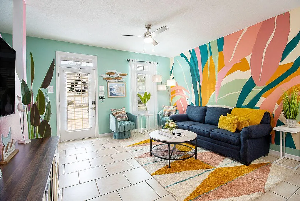 Natural light floods the space, creating an ethereal ambiance that complements the tropical coastal theme evoking a sense of peace and harmony. - 1110 Century Oaks Dr