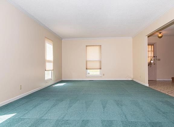 The living room measures 25 x 13. All the carpets throughout have been professionally shampooed and the entire house professionally cleaned.