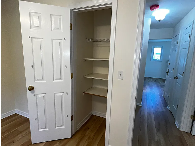 2nd Bedroom opposite Master Bedroom smaller than master, likewise with ceiling fan and smoke detector.