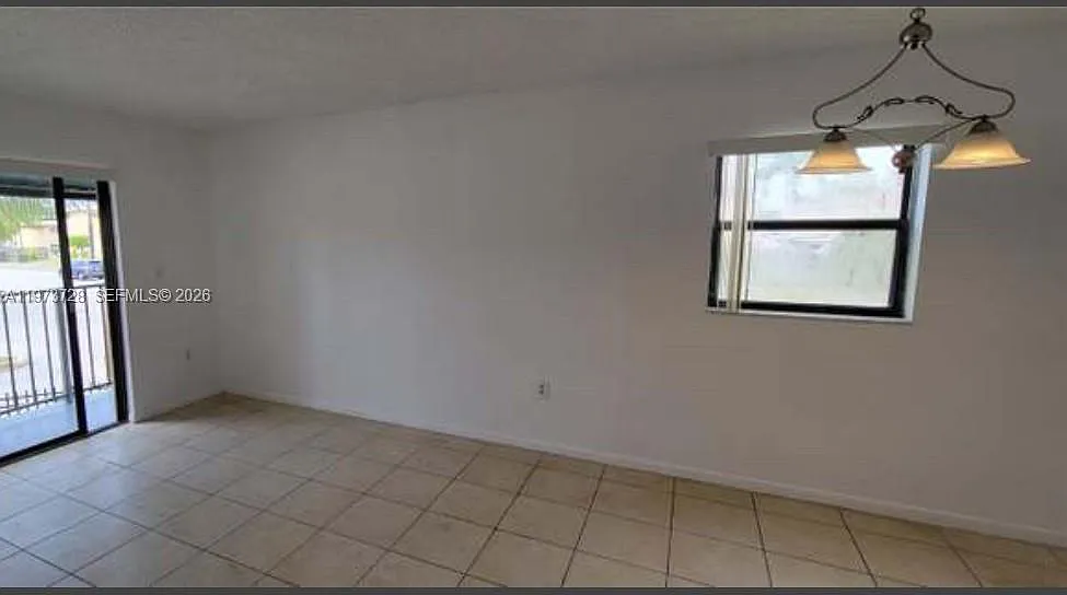 Building Photo - 7401 SW 152nd Ave #2051