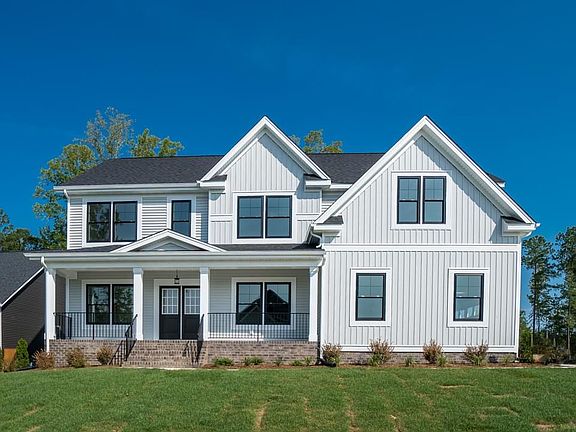 Farmhouse Elevation with Extended Front Porch and Sideload Garage