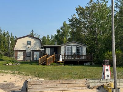 3981 Pointe Dr, Carp Lake, MI, 49718