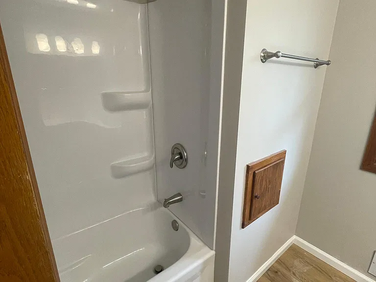 New main level flooring & tub/shower. BONUS: clothes chute