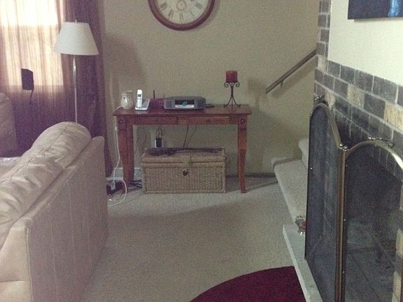 Living Room with wood burning fireplace