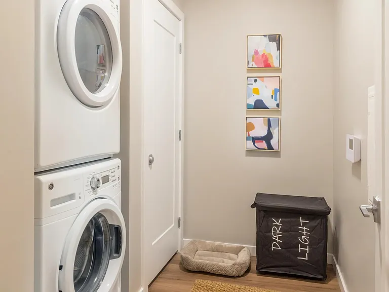 Full-size front loading washers and dryers.