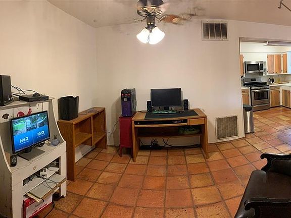 This is the breakfast area right off of the kitchen and could probably seat 6 people comfortly around a table.