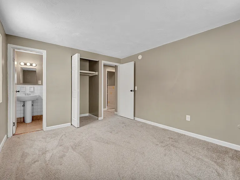 Master bedroom with half bath