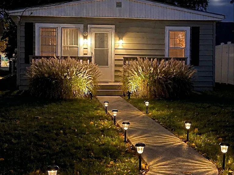 House at night with solar lights