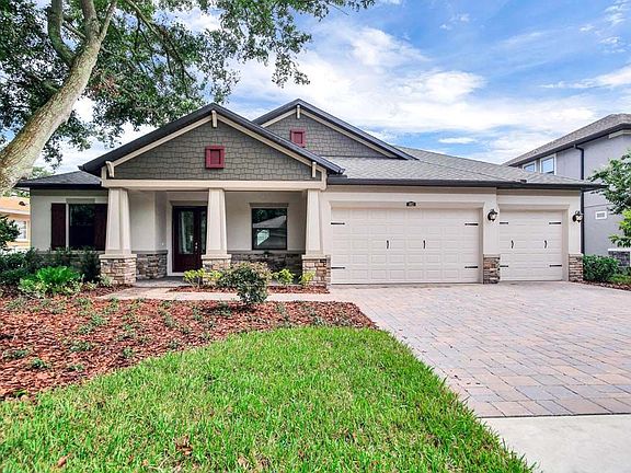 Joyce new home craftsman with optional stone front exterior William Ryan Homes Tampa