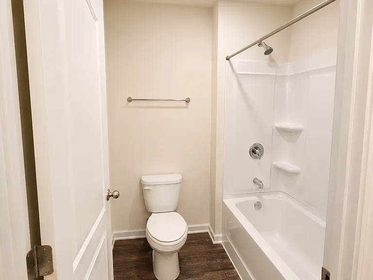 Upstairs bathroom #2 privately toilet and bathtub.