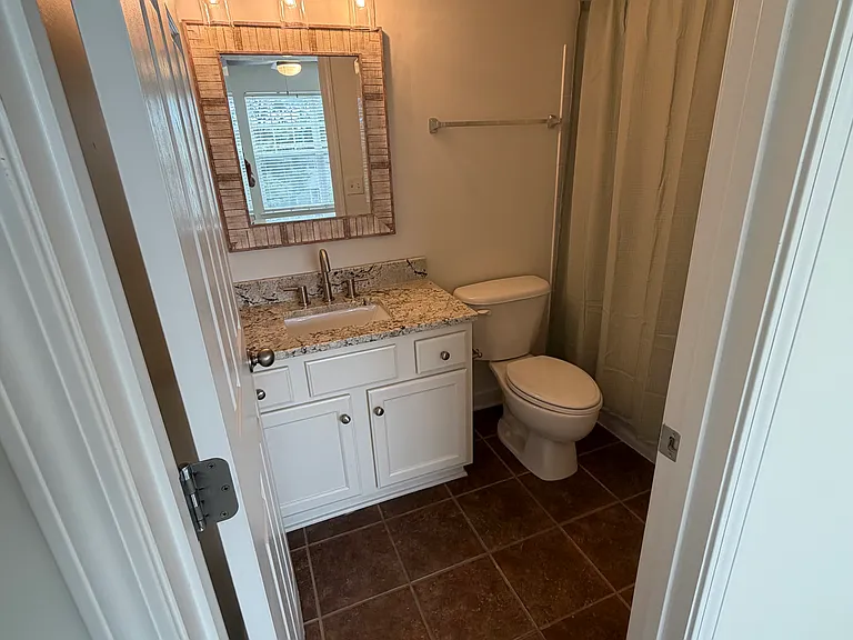 Additional view of the full bathroom in bedroom #1.