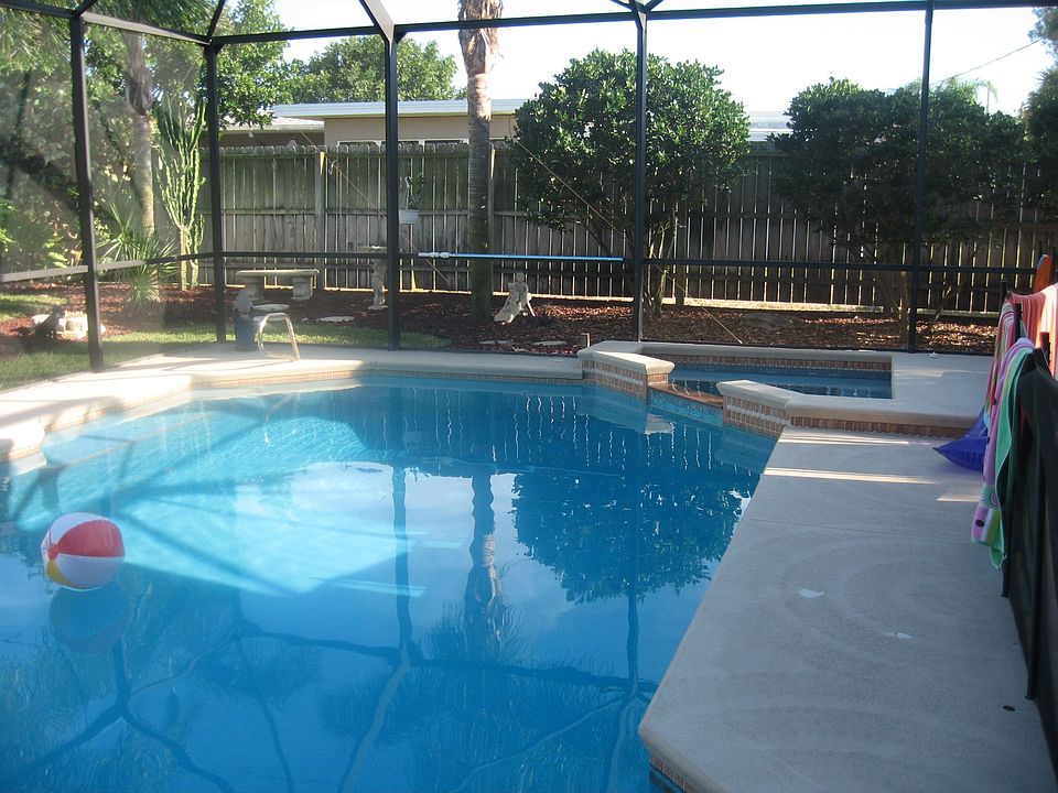 Large, heated, screened pool with spa