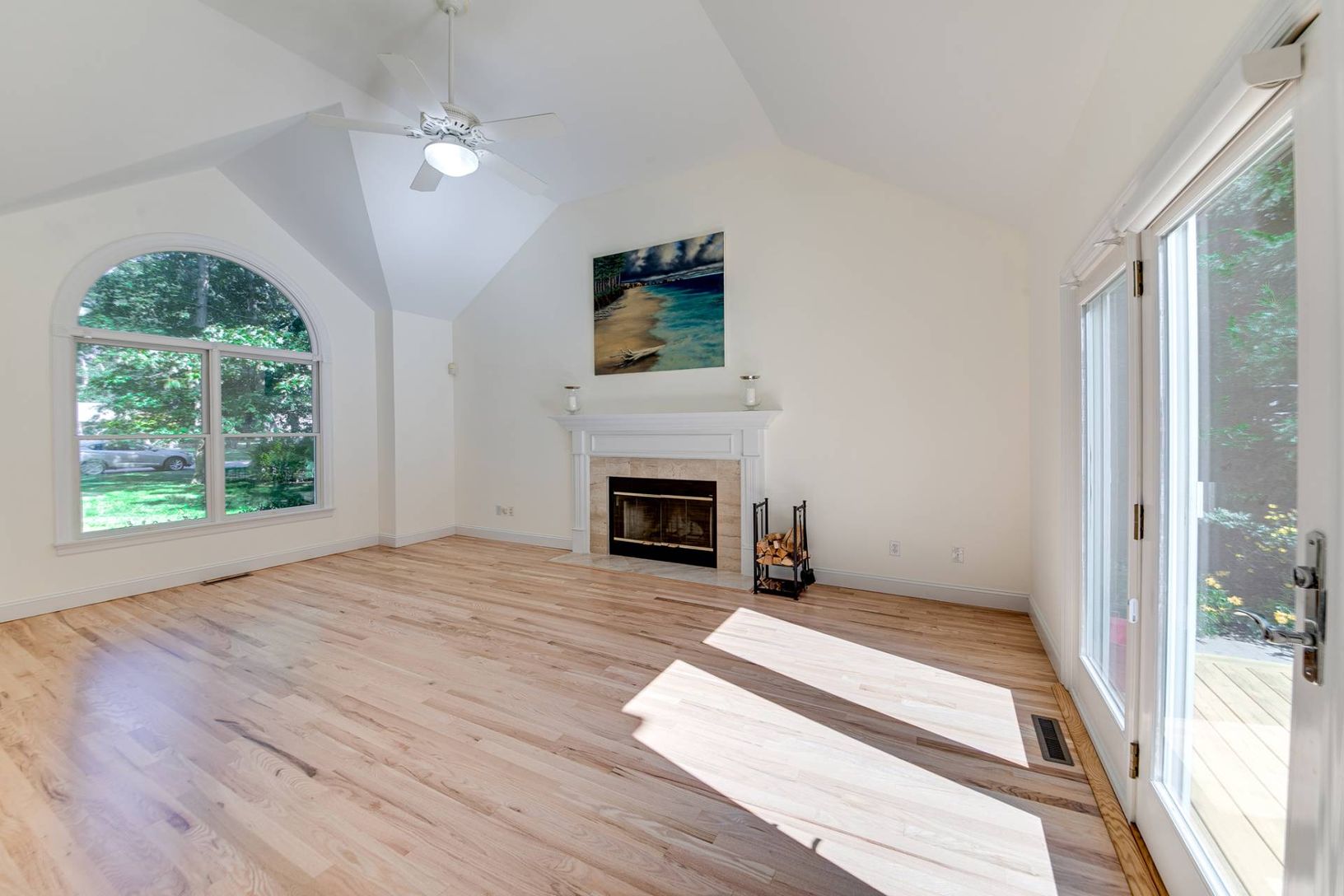  Light and Bright Living Room with Wood Burning Fireplace