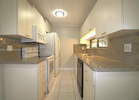 4th image of 5720 Simms St