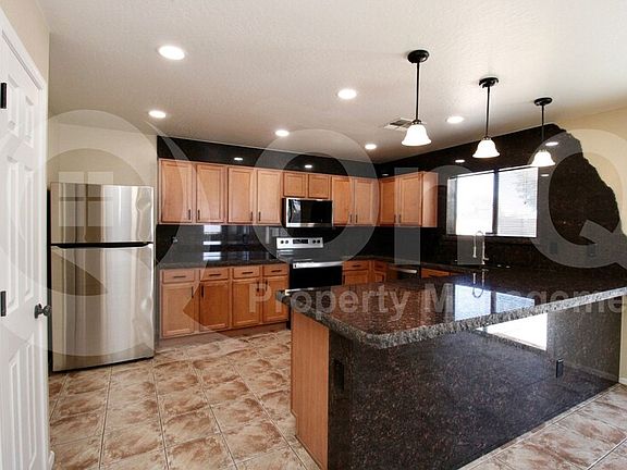 4th image of 9917 W Miami St