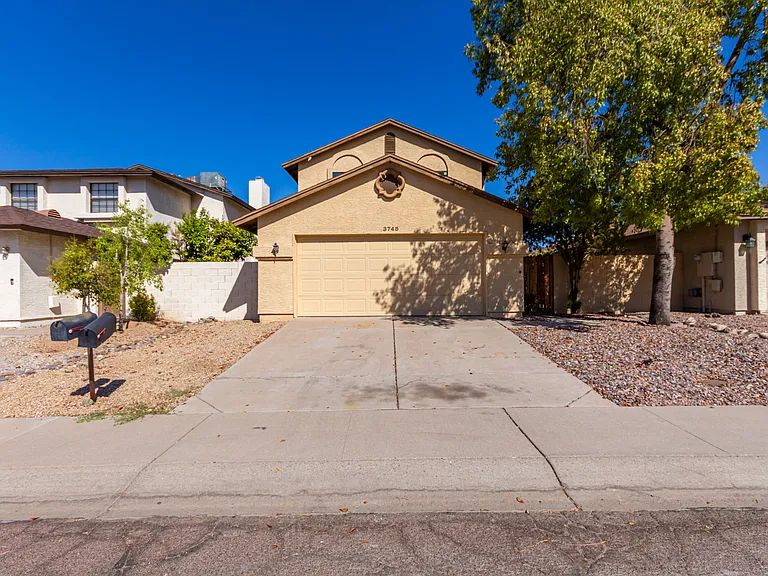 2 Car Garage + Privacy Gate to Get to Front Door.