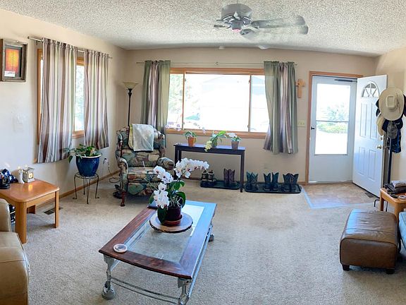 spacious living room with a lot of natural light.