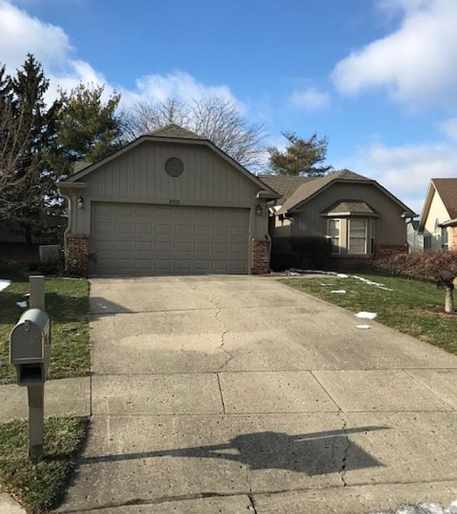 Street view with two car attached garage