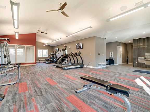 Our fitness center includes a yoga/spin studio, cardio equipment, weightlifting machines and free weights.