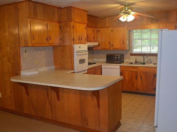 spacious kitchen, micrfowave, gas range, oven, double refrigerator