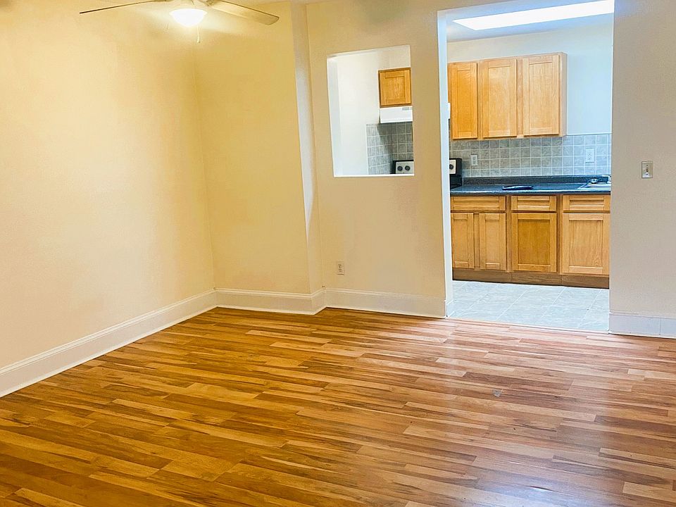 Living Room and Skylit Kitchen