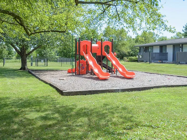 Playground with brand new orange equipment