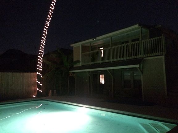 Back yard with pool and decks