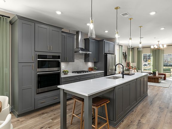 A stylish kitchen with stainless steel appliances, perfect for entertaining