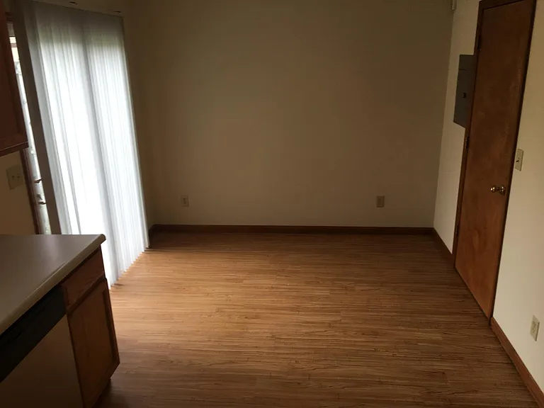 Eat in kitchen. Door on the right leads to laundry room with washer and dryer hook up