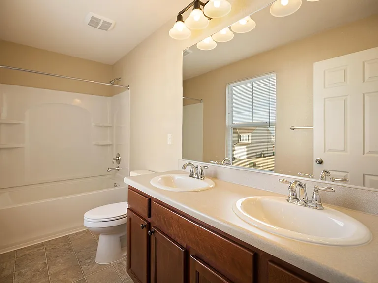Upstairs Hall Bathroom with double sink.