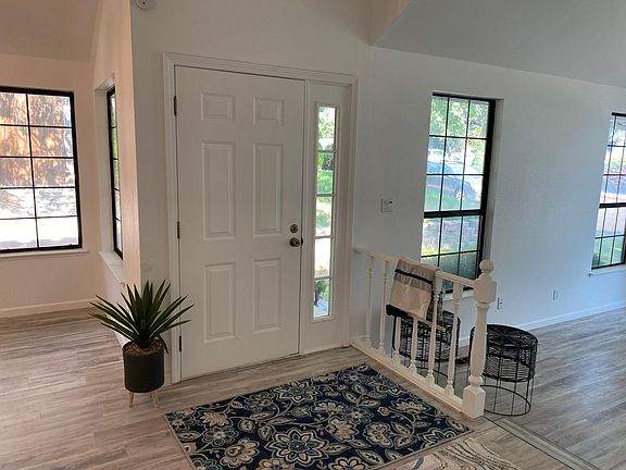 Front Entry -Left dining room, right one step down to living room