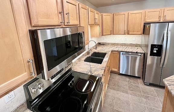 ALL NEW stainless steel appliances, NEW granite counters
