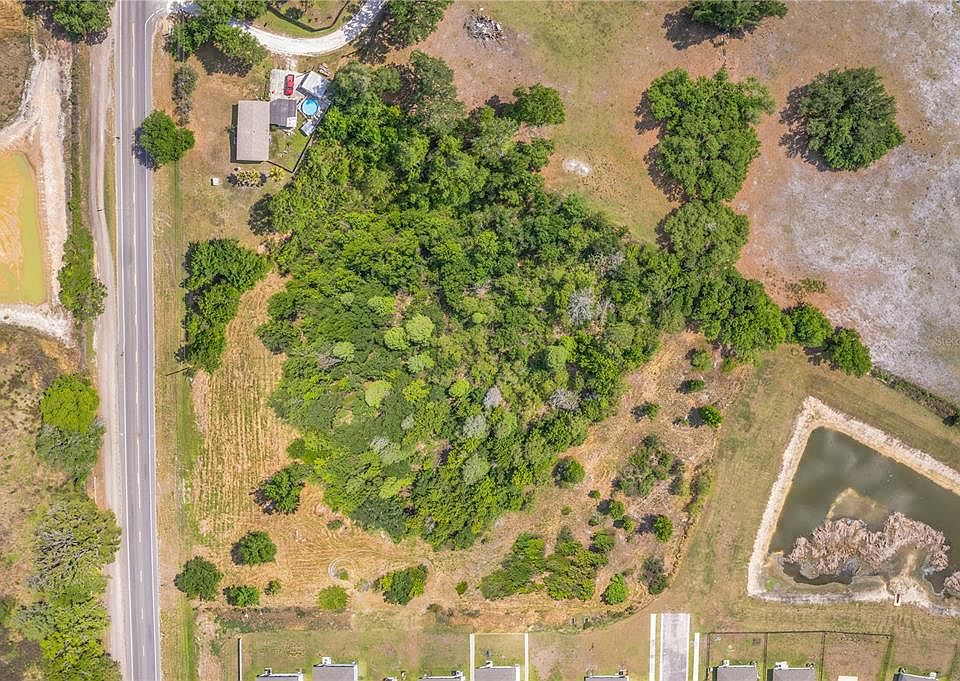 1st image of CORNER OF PAUL S BUCHMAN HWY & FORREST PLUM CT