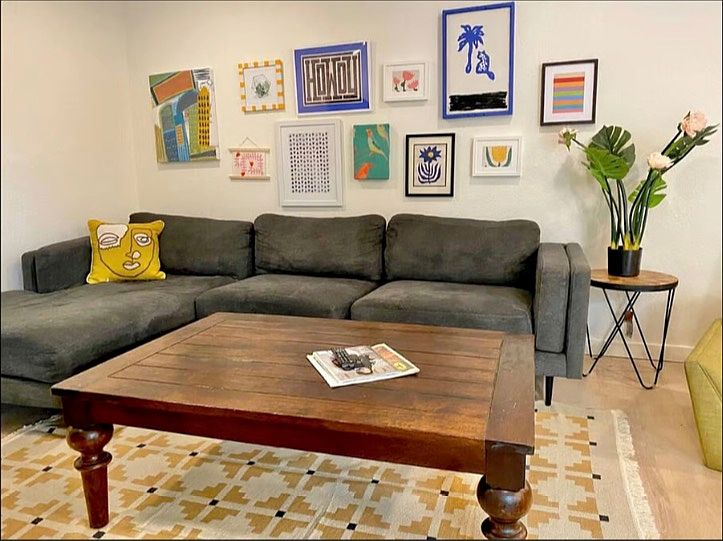 Living room with sectional sofa and art
