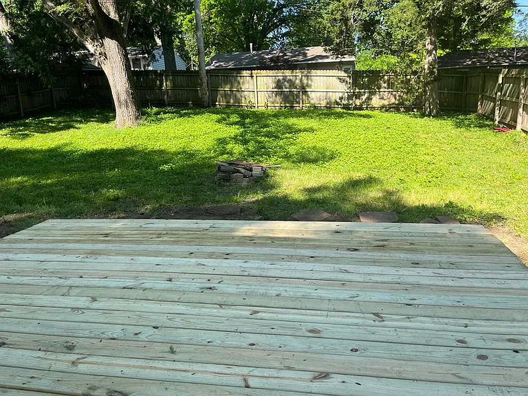 New deck and large fenced in backyard!