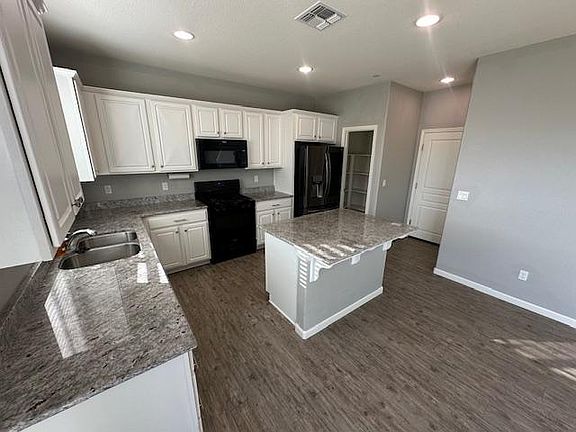 5th image of 6611 E Geary St