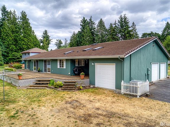 Besides the detached 2080 sq ft RV garage & shop, this home offers an attached 3-car garage as shown.  Plus, there is abundant o