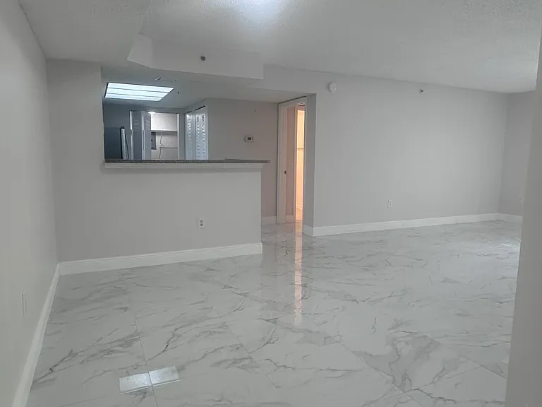 5011 Wiles Rd #207 — Photo 3