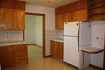 Another view of the kitchen..The woodwork is in excellent condition. There is also a double pantry.