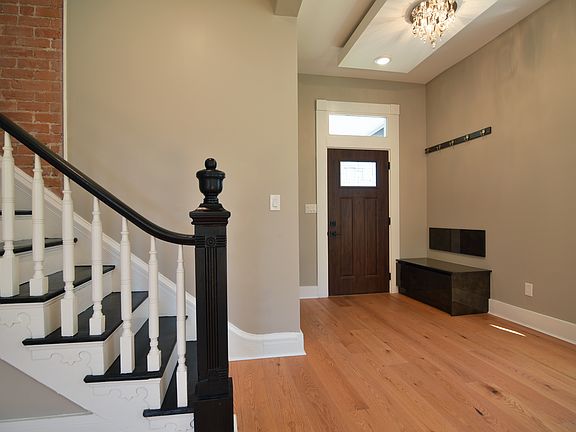 Restored original staircase with special architectural features above.