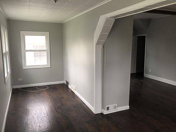 Space off livingroom could be reading nook or office space