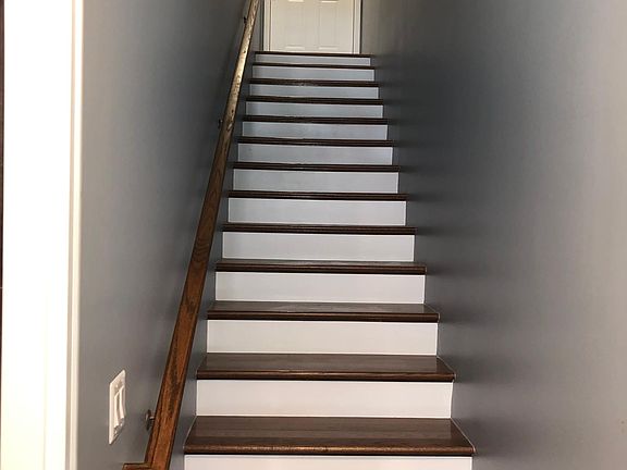 Interior stairs leading to unit.