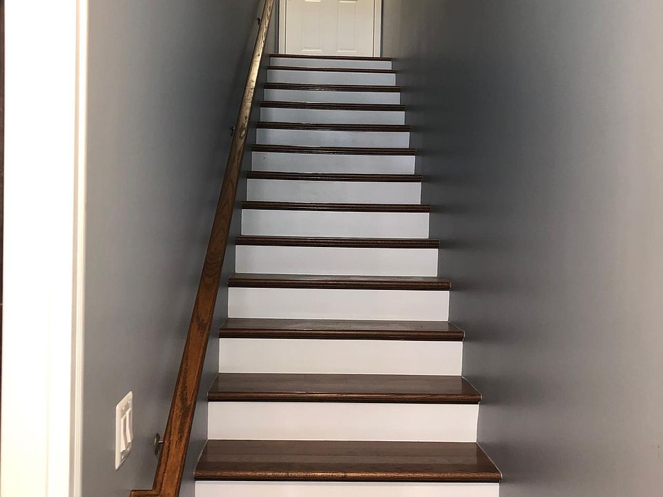 Interior stairs leading to unit.