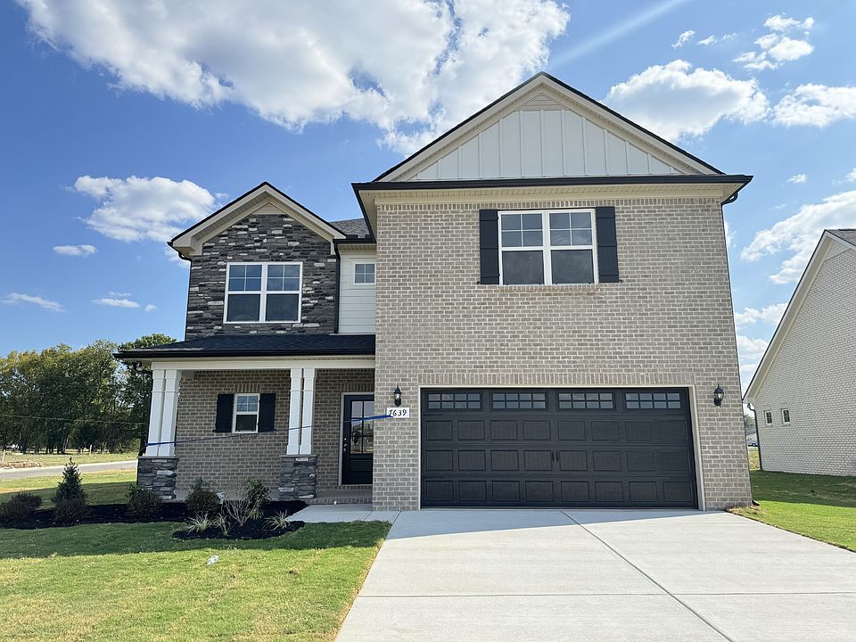Beautiful all-brick home on a corner lot with 4 bedrooms, 2.5 baths, a bonus room, and an office, o
