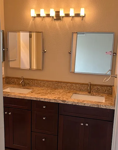 Main bath/vanity with double sinks.